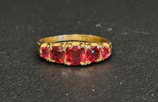GRADUATED RUBY FIVE STONE RING the cushion cut gemstones ranging from approximately 0.5cts in the
