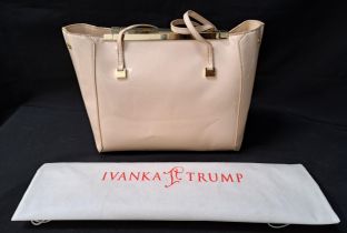 IVANKA TRUMP LADIES HANDBAG in cream vinyl with twin carry straps and brass fittings, snap closure