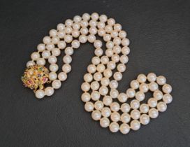 DOUBLE STRAND PEARL NECKLACE with diamond, ruby, emerald and sapphire set fourteen carat gold