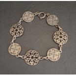 JOHN HART IONA SILVER BRACELET with alternating entwined pierced and motif decorated links, 20.5cm