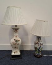 POTTERY BALUSTER LAMP decorated with birds and foliage, with a pleated white shade, 61cm high,