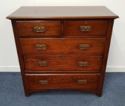 ARTS AND CRAFTS OAK CHEST OF DRAWERS with a moulded top above two short and three long graduated