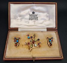 UNUSUAL MULTI GEM SET BROOCH AND MATCHING EARRINGS all of branch design and set with diamonds,