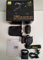 BOXED NIKON D90 CAMERA KIT including the digital camera, Af-S Nikkor 18-105mm lens, quick charger,
