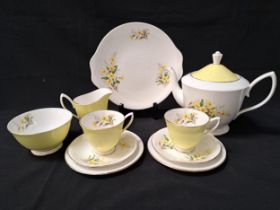 ROYAL ALBERT PRIMROSE TEA SET comprising six cups and saucers, six side plates, sandwich plate, milk