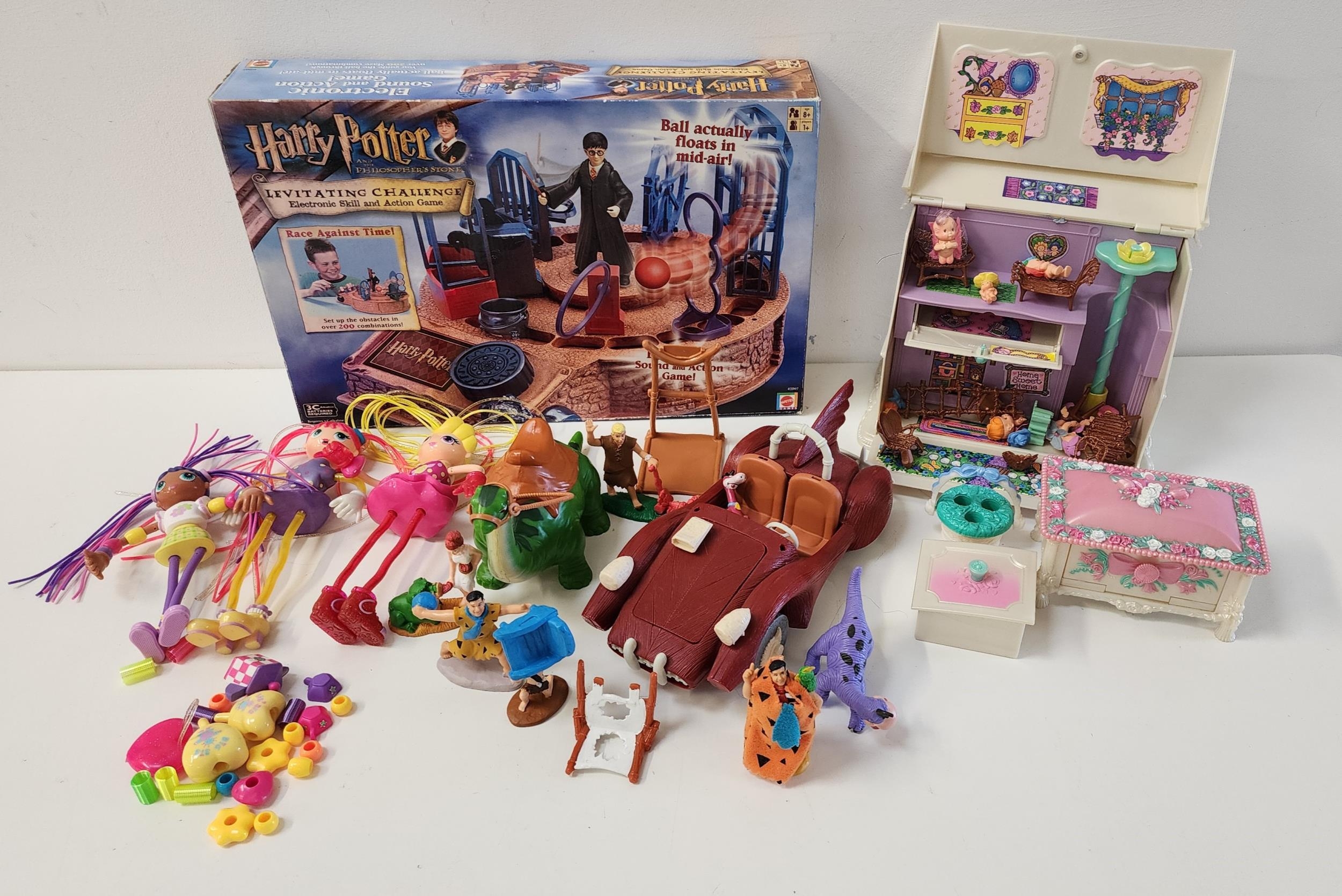 SELECTION OF TOYS comprising Tonka fairies and accessories, Betty Spaghetti dolls, Flintstones car