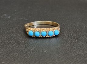 TURQUOISE FIVE STONE RING the round cabochon turquoise stones on nine carat gold shank, ring size