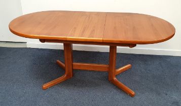 MID CENTURY TEAK D END DINING TABLE with a pull apart top revealing a fold out leaf, standing on