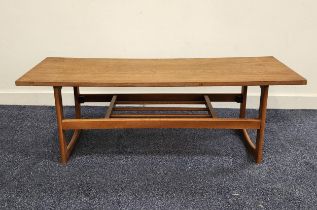 MID CENTURY TEAK OCCASIONAL TABLE with a rectangular top on continuous supports united by a