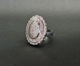 IMPRESSIVE DIAMOND COCKTAIL CLUSTER RING the multiple round and baguette cut diamonds totalling