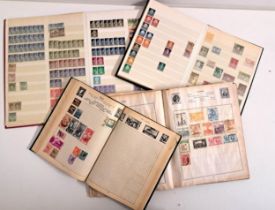 SELECTION OF BRITISH AND WORLD STAMPS contained in four albums, together with a selection of loose