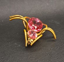 VINTAGE SPIDER BROOCH set with two graduated faceted pink glass sections, 5cm wide