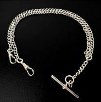 A silver double-Albert chain, with t-bar and two dog clips, 55cm long, gross weight approximately