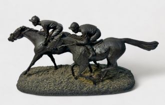 A David Geenty bronzed resin figure group depicting racing horses with jockeys, ‘Flat Out’, DG34,