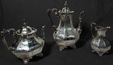 A Victorian three-piece part tea and coffee set, of octagonal baluster form with foliate engraved