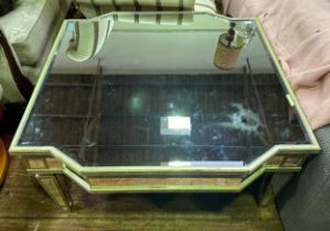 A contemporary mirrored shaped coffee table, gilt frame with large bevelled mirror top and