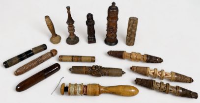 Twenty-three various wooden Treen needle cases including a 1842 Thames Tunnel souvenir, various