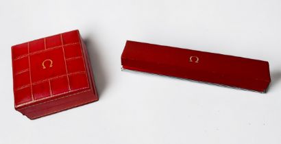 Two vintage red leather Omega wristwatch boxes, both with branded and lined interiors