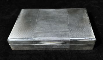 A George VI Silver table-top cigarette box, of rectangular form with engine-turned hinged cover
