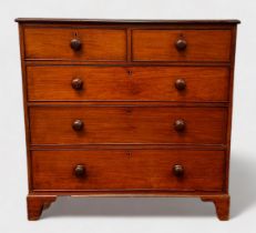 A 19th Century mahogany chest of two short and three long graduated drawers, with turned pulls and