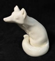 Royal Doulton figure of a seated fox, HN147B, rare cream colourway glaze, 4.5 inches high, mark to