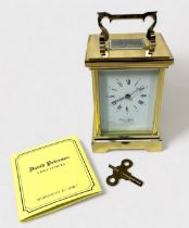 A modern brass cariage clock, by David Peterson, with spring-driven eight-day movement striking a