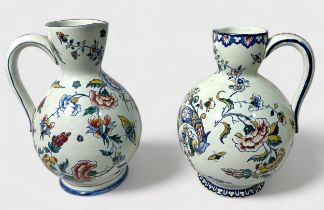 Two 19th century French faience jugs, each with polychrome floral decoration, underglaze blue '