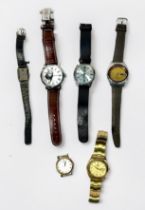 A collection of six assorted gents and ladies Seiko wristwatches including a gold-plated Seiko 5,