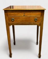 An early 20th century stained walnut work table, of rectangular form with hinged top enclosing