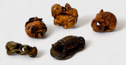 Five various Japanese carved and stained boxwood Netsuke, signed, including, tortoise on leaf, two