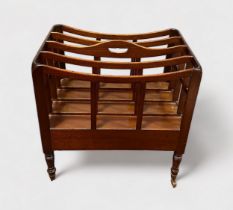 A 19th Century mahogany Canterbury, of traditional form, with four section slatted top over base