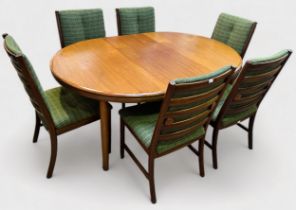 A mid-20th century teak extending dining table and six chairs, believed to be by White & Newton, the