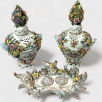 A pair of 19th c entury Dresden 'style' flower-encrusted pierced pot-pourri vases and covers with
