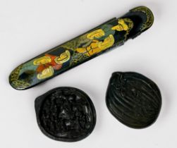 An antique papier maché lacquered qalamdan (pen box) with sliding implement tray, painted with