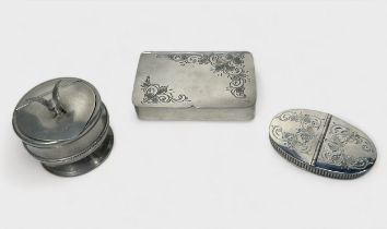 Three white metal snuff boxes including a large square example with bright cut floral decoration,