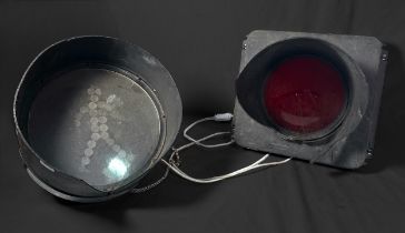Two hooded traffic signal lights, wired with UK plug, to include, a Pedestrian Crossing ‘Walking