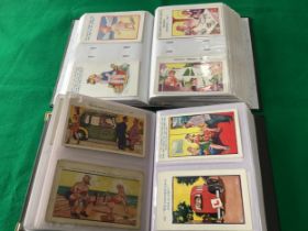 Approximately 400 standard-size humorous and comic postcards in two albums. Various artists