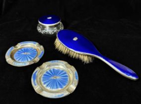 A silver and blue guilloche enamel handbrush and matching topped cut-glass toilette jar both mounted