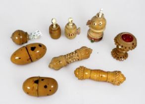 Nine late 19th century carved vegetable ivory sewing items including a chess-piece tape measure/
