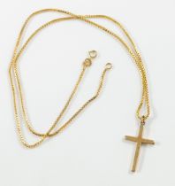 A 9ct yellow gold cross, 3cm in length, with a 9ct yellow gold box-link chain, 20 inches in