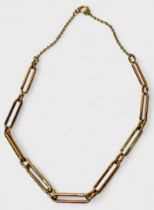 An antique 9ct gold Albert chain of alternating long link and short links, converted to a