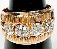 An 18ct yellow gold wide-band ring, claw set with 4 x Victorian cut diamonds to the centre,
