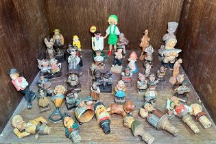 A collection of assorted carved wooden figures and figural carved bottle stoppers etc. (SECTION 40)