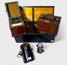 Two early 20th Century cased electrical instruments with leather carry handles by Evershed &