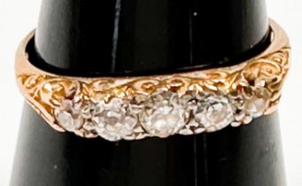An 18ct yellow gold diamond ring, set with 5 x graduating Victorian cut diamonds in a gypsy style