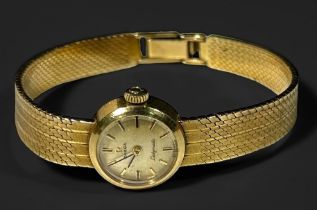 An Omega 'Ladymatic' Cocktail watch, with 9ct gold 15mm diameter case and integral gold woven