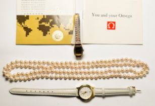 A ladys Omega wristwatch, with 9ct yellow gold case, and stainless steel expanding bracelet, gold