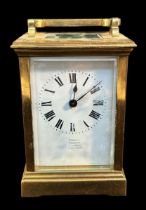 A Brass Cased Carriage Clock, with French spring-driven 8-day movement, white enamel dial with Roman