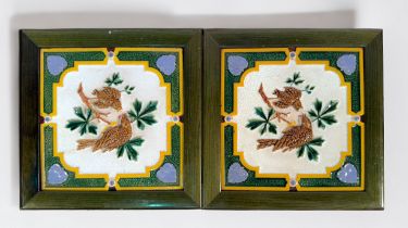 A pair of Victorian Minton Hollins & Co tiles, c.1870, Majolica, raised mother bird feeding a worm