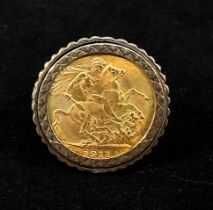 A 9ct gold ring set with a George V 1911 22ct gold full-Sovereign, gross weight approximately 16.9